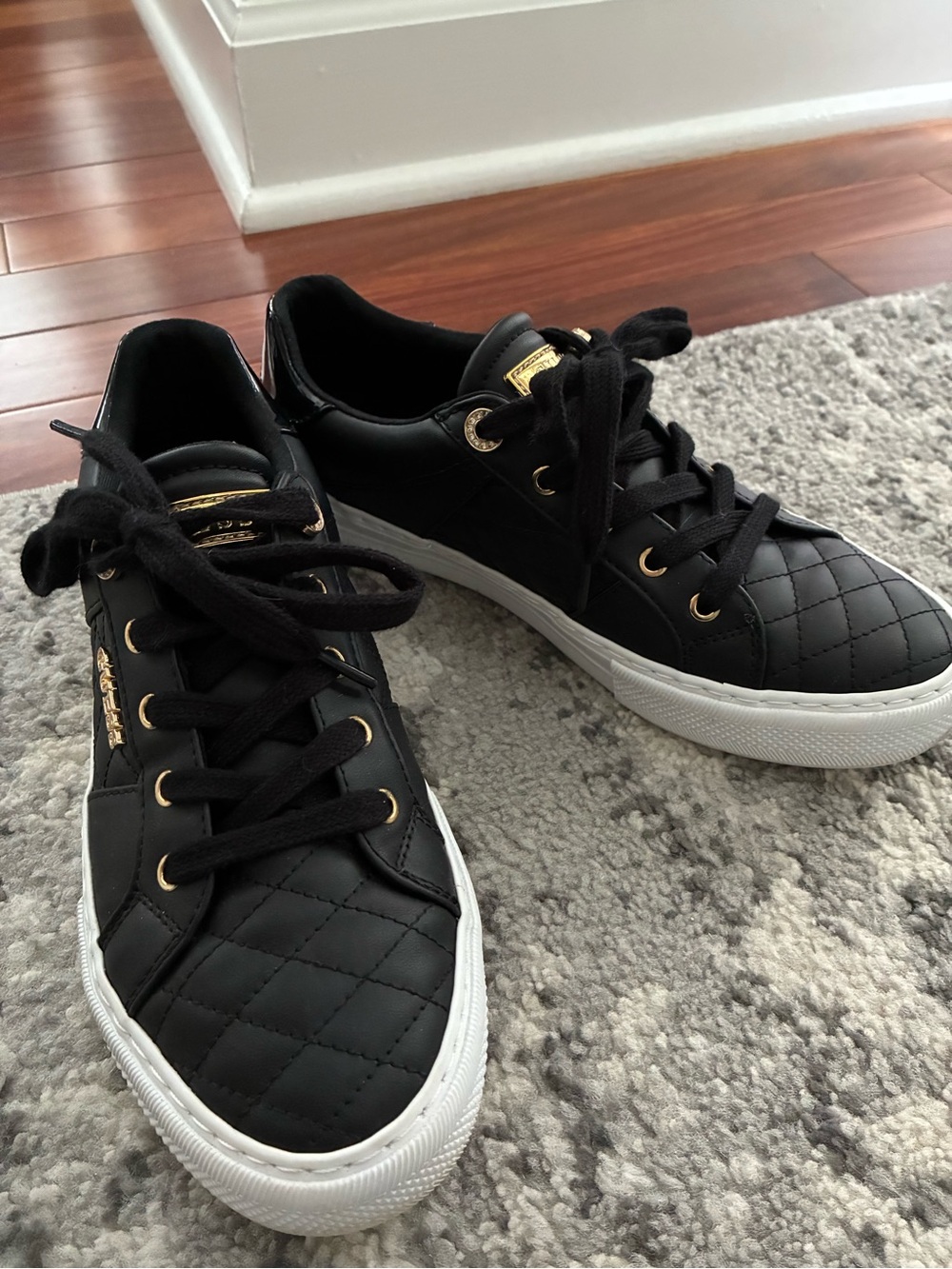 Guess Black Quilted Lace-Up Sneakers with Gold Accents